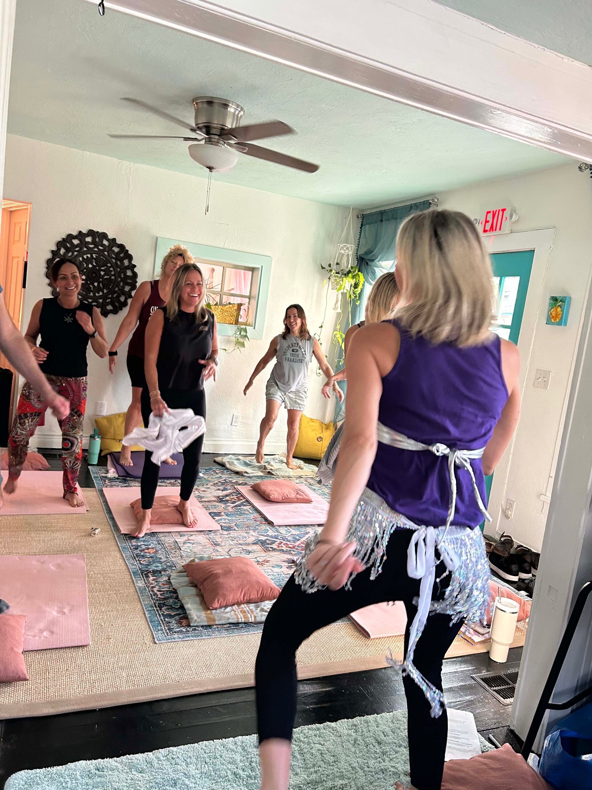 Participants moving together during a movement workshop