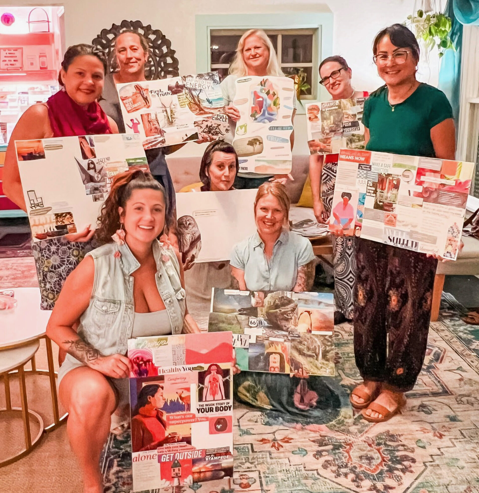 Guests creating vision boards during a workshop at the cottage